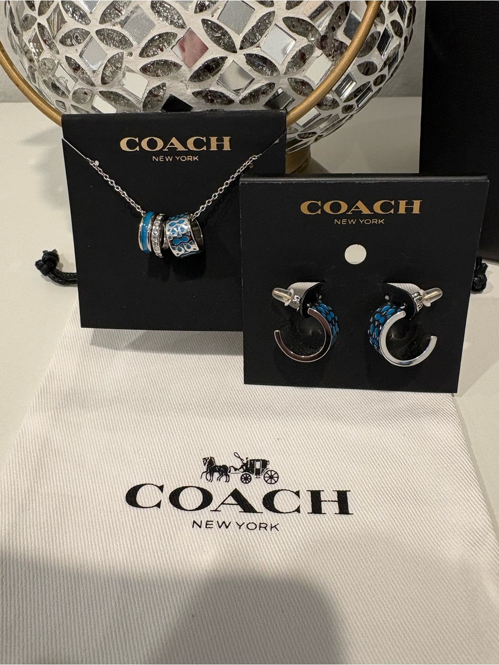COACH Silver-Tone Hoop Earrings with Blue Enamel Accents